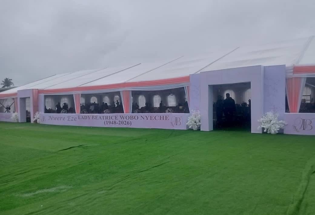 Branded memorial marquee with custom entrance facade.